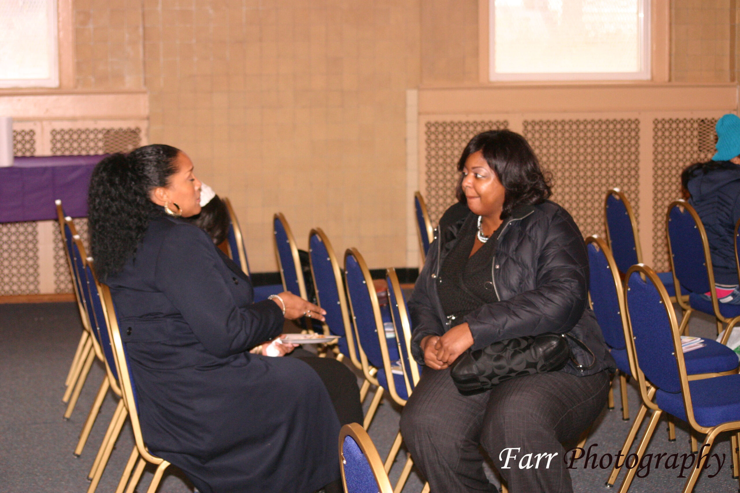 Women connecting at an EWEV event