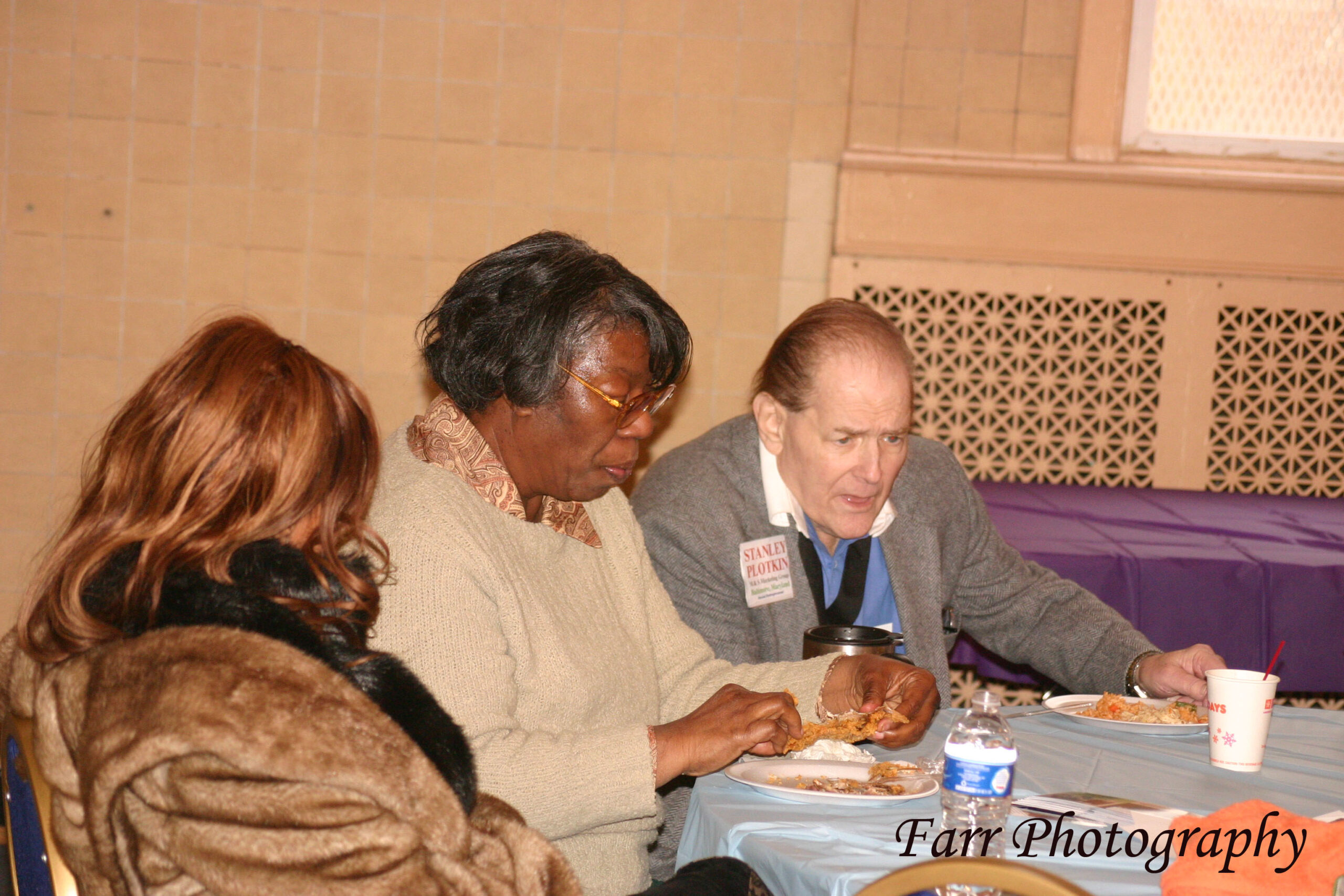 Guests sharing a meal at an EWEV gathering